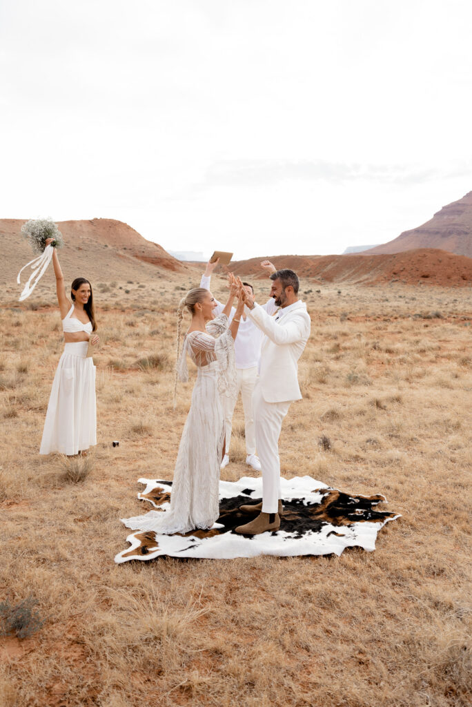 Utah wedding photographer captures couple and friends celebrating recent marriage