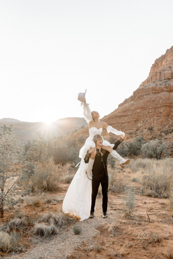 Utah elopement photographer captures bride and groom celebrating together