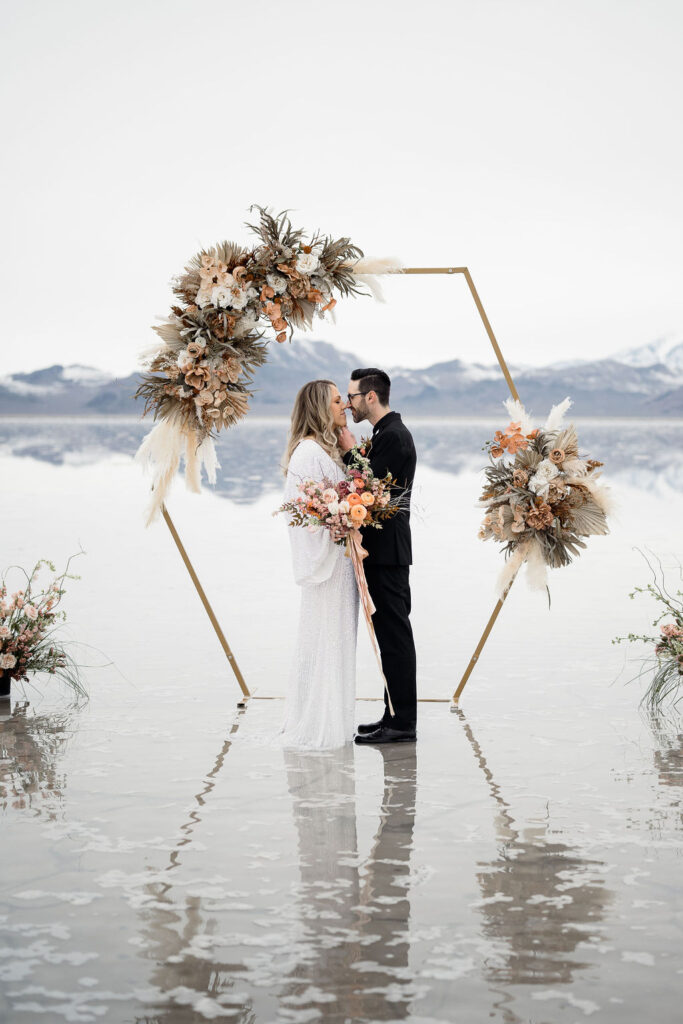 Utah elopement photographer captures bride and groom kissing as husband and wife