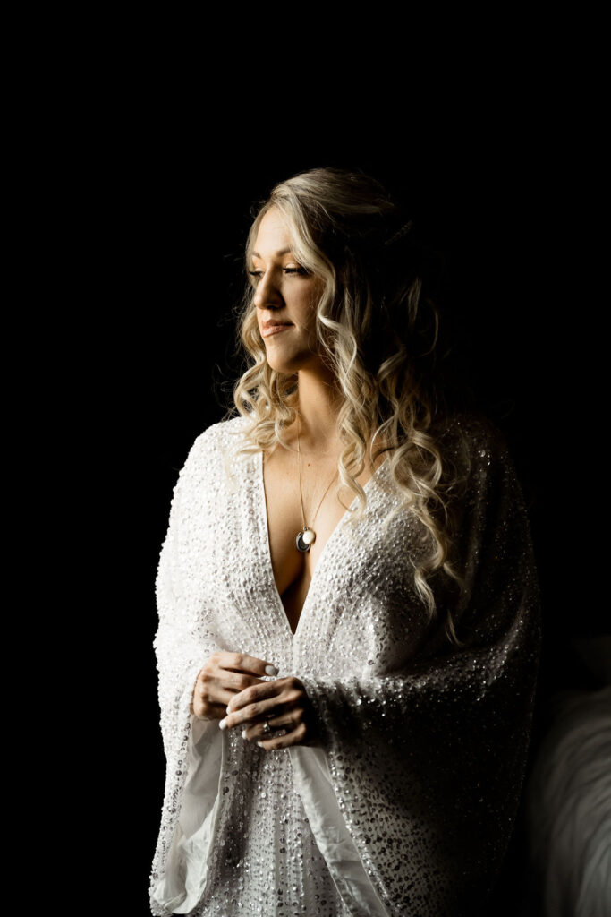 Utah elopement photographer captures bride in wedding gown before Bonneville salt flats wedding