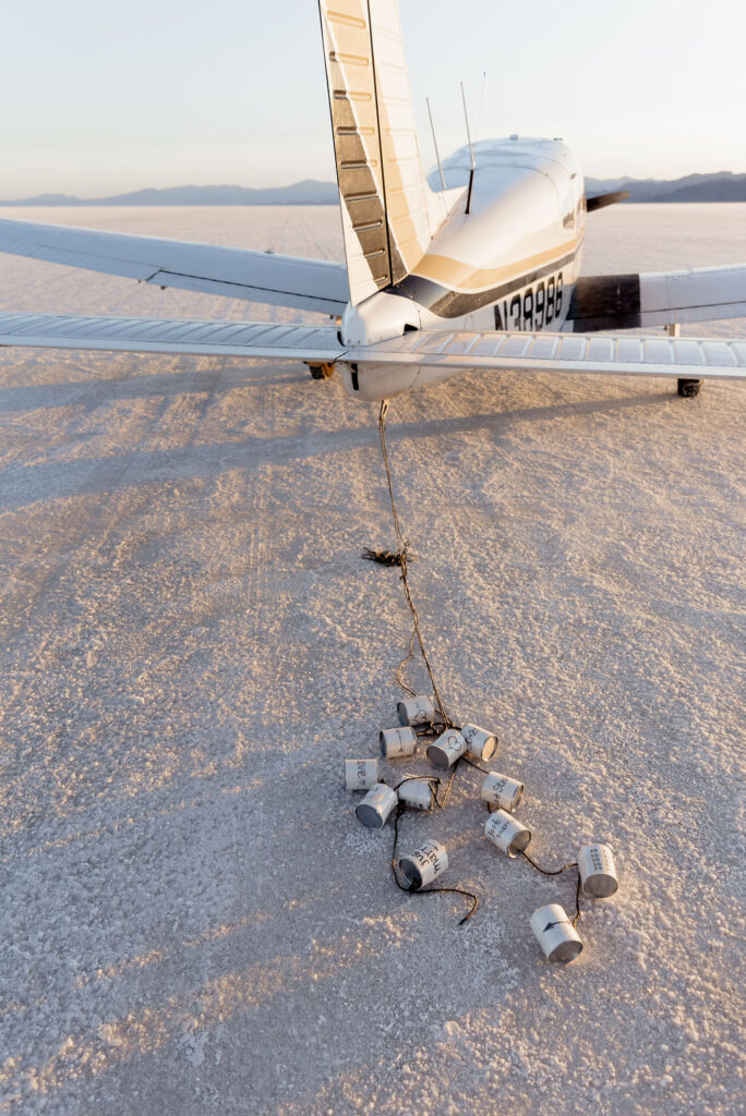 Utah elopement photographer captures airplane with soda cans attached to wing