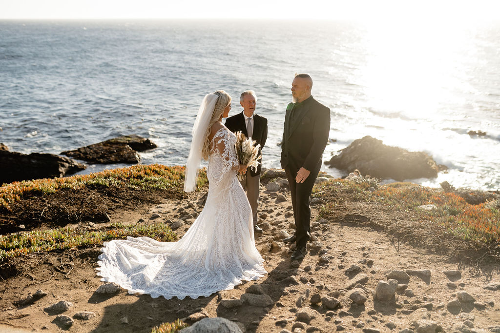 Big Sur elopement photographer captures couple during wedding ceremony