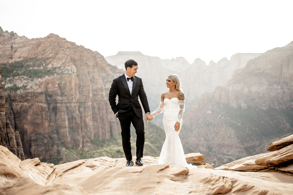 Utah elopement photographer captures bride and groom standing together in Zion National Park
