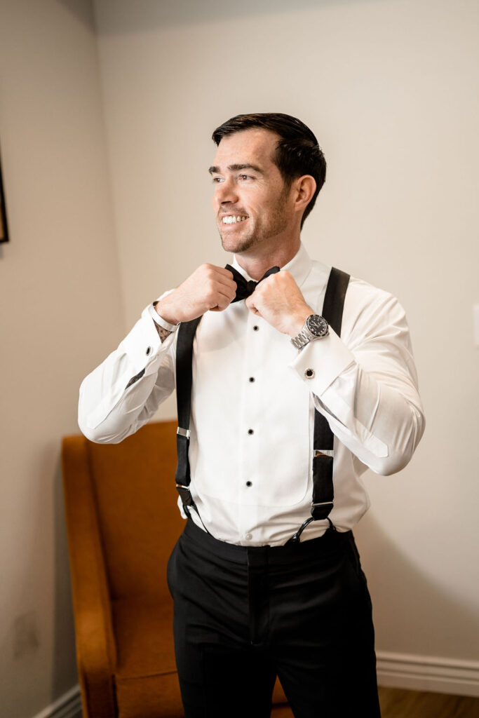 Utah elopement photographer captures groom getting ready before wedding