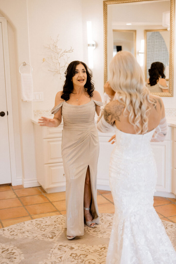 Utah elopement photographer captures mother seeing bride for first time in wedding dress