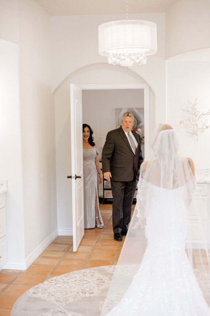 Utah elopement photographer captures first look between bride and her father before Zion National Park wedding