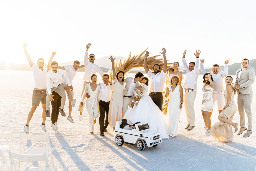 Utah elopement photographer captures wedding party celebrating recent wedding ceremony