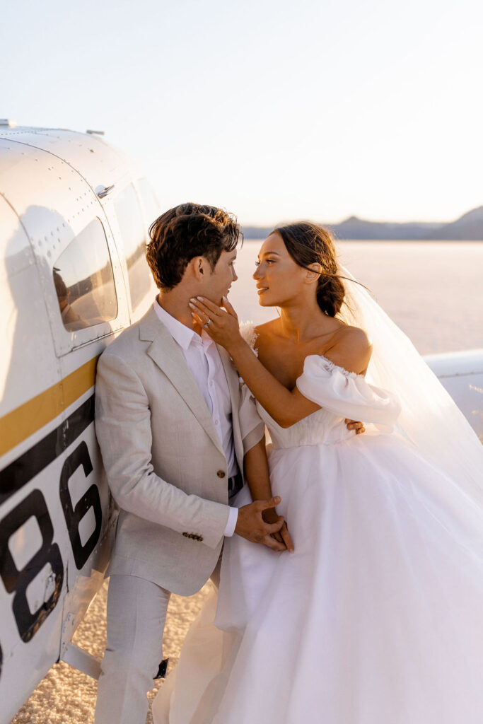 Utah elopement photographer captures couple on airplane after wedding