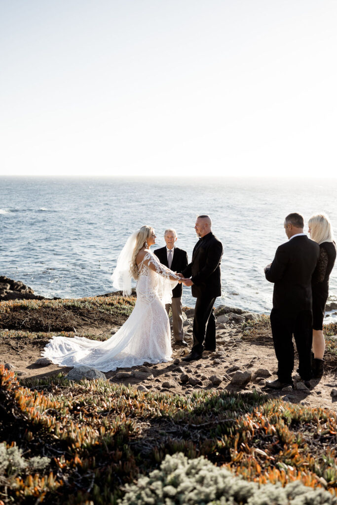 Big Sur elopement photographer captures couple getting married by the beach