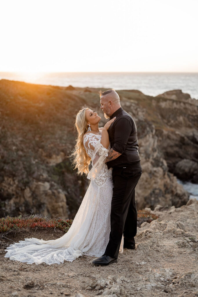 Big Sur elopement photographer captures couple during sunset bridals
