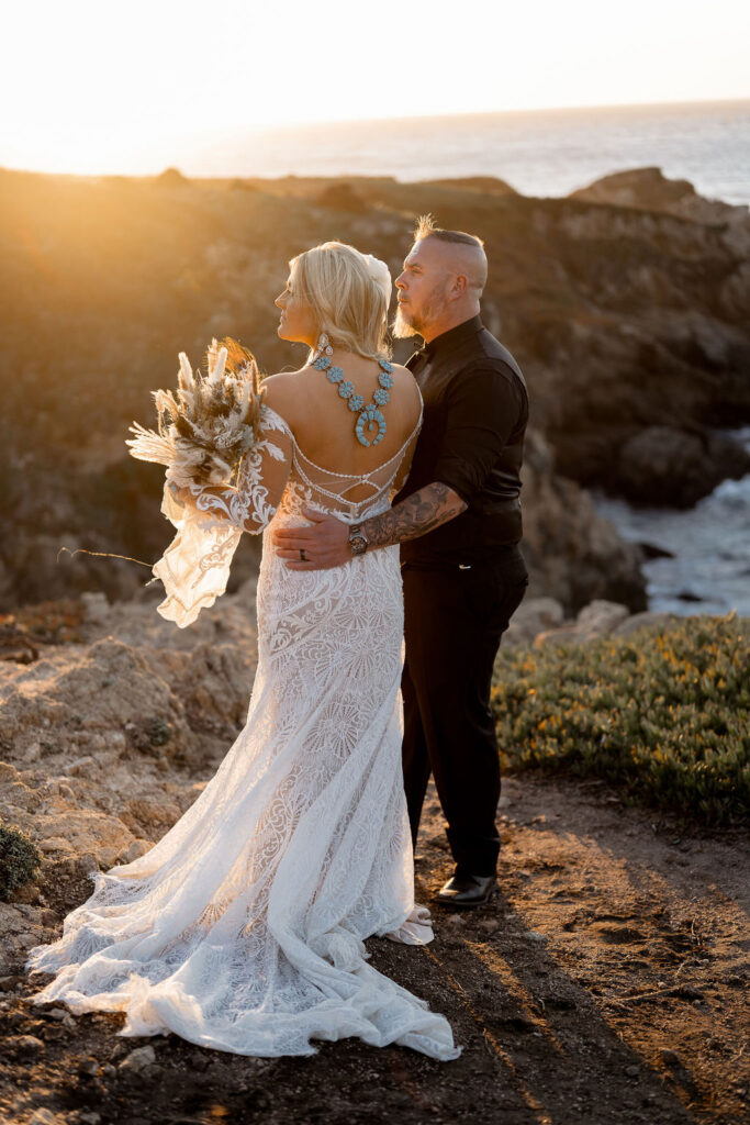 Big Sur elopement photographer captures sunset portraits of wedding attire