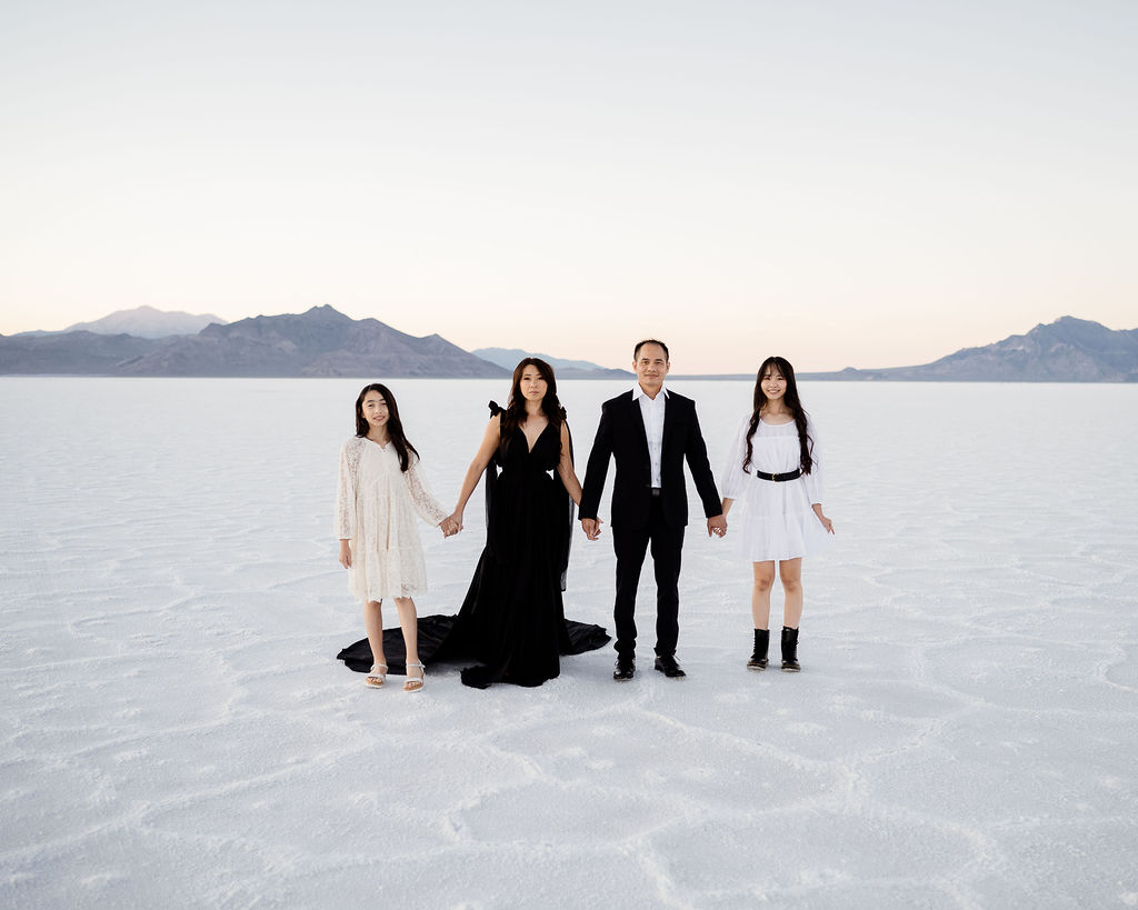 family at the salt flats at sunset in dresses and suits (black and white)