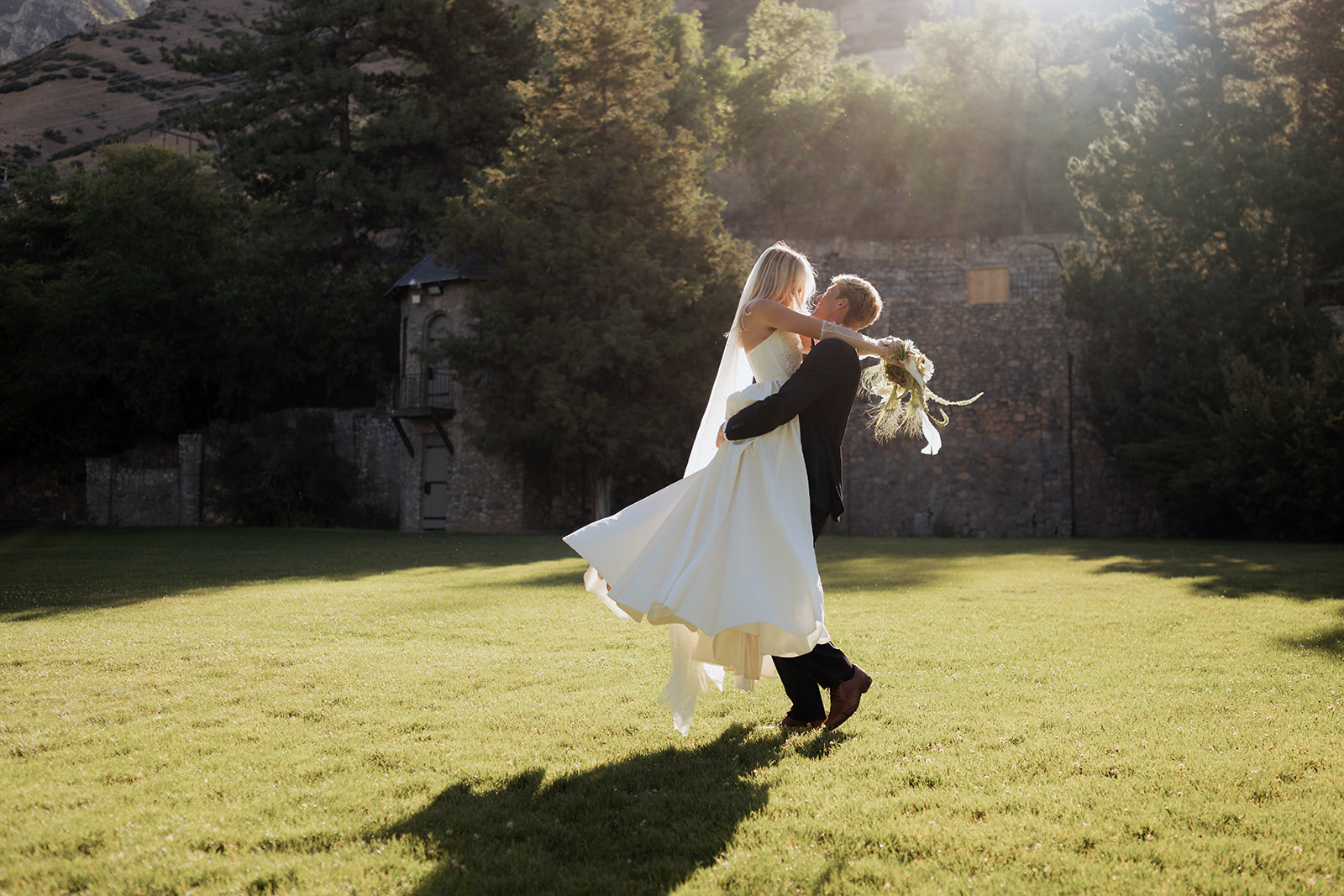 European-inspired wedding venue with couple twirling around