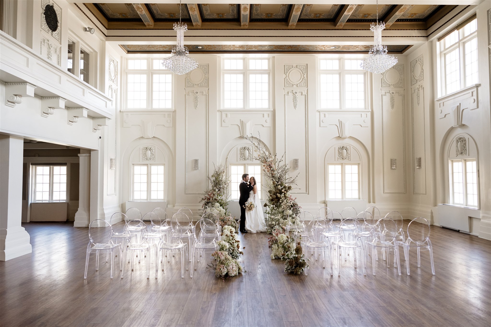 Bride and groom in a modern commercial building for their wedding, photographed by Becca Dahl.