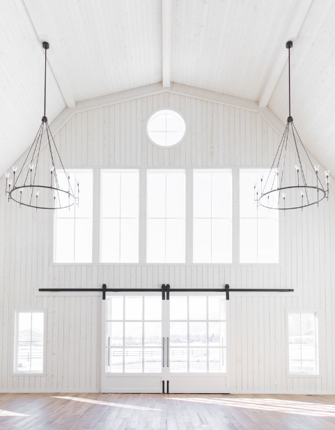 River Bottoms Ranch indoor reception space with rustic wooden beams and elegant wedding decor in Utah.