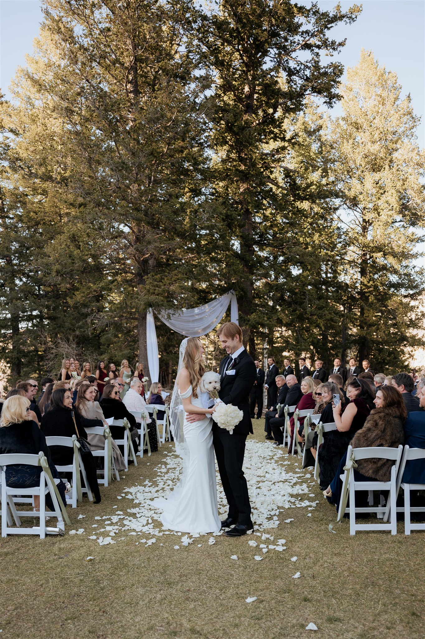 Bride and groom during their Solitude Mountain Resort wedding ceremony in Big Cottonwood Canyon, Utah